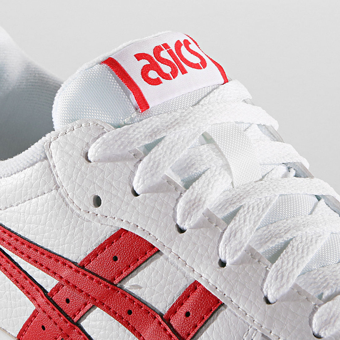 red asic shoes