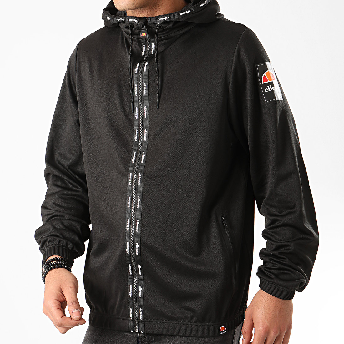 Ellesse - Veste Zipp?�e Capuche A Bandes Ripari SHE08567 Noir - LaBoutiqueOfficielle.com