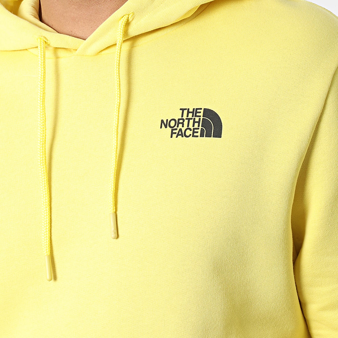 The north face pull jaune best sale