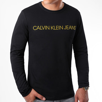  Calvin Klein - Tee Shirt Manches Longues Gold Institutional 7721 Noir Doré