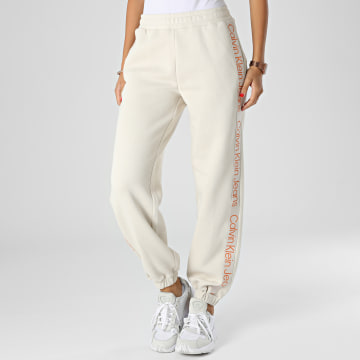  Calvin Klein - Pantalon Jogging Femme A Bandes Logo Tape 9738 Beige