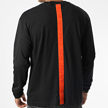  Calvin Klein - Tee Shirt Manches Longues Logo Tape 2556 Noir