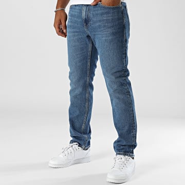 Tommy Jeans - Ryan 9302 Blauwe Denim Regular Fit Jeans