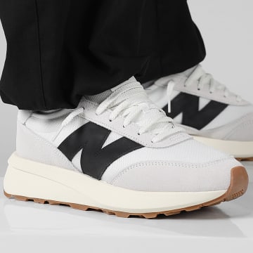 New Balance - 370 U370CA Zeezout Zwart Cement Sneakers