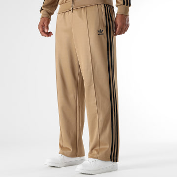 Adidas Originals - Jogginghose mit Streifen Baggy Firebird JY1419 Camel