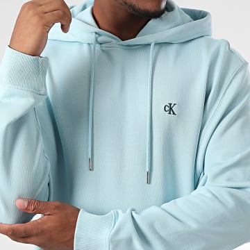 Calvin Klein - Sweat Capuche 297G Bleu Clair