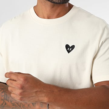 Luxury Lovers - T-shirt oversized groot zwart hart borduursel beige