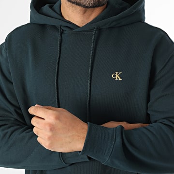Calvin Klein - Sweat Capuche RC297 Bleu Pétrole Doré