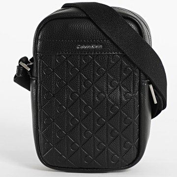 Calvin Klein - Sacoche Emblem AOP Embossed Reporter D3228 Noir