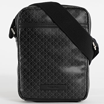 Calvin Klein - Sacola Emblem AOP Coated Slim Reporter D3334G Preto