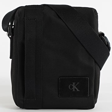 Calvin Klein - Bolsa Canvas Mix Reporter D3366G Preto
