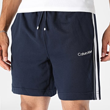 Calvin Klein - Calção de treino a faixas Logo Tape Terry 801 Azul Marinho