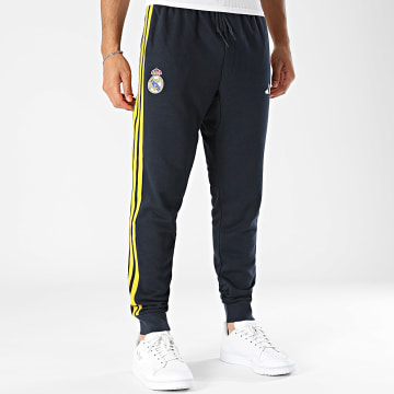 Adidas Sportswear - Pantalone Jogger A Bande Real Madrid DNA KG2951 Blu Marino Giallo