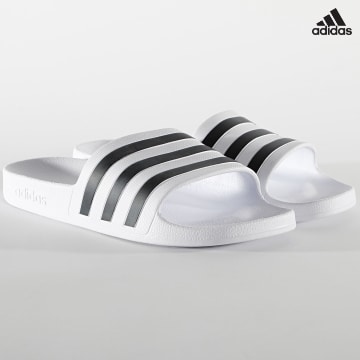 https://laboutiqueofficielle-res.cloudinary.com/image/upload/v1627638668/Desc/Watermark/adidas_performance.svg Adidas Sportswear - Claquettes Adilette Aqua F35539 Footwear White Core Black