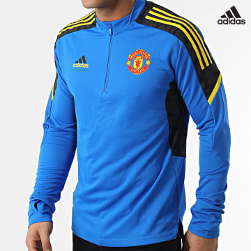 https://laboutiqueofficielle-res.cloudinary.com/image/upload/v1627638668/Desc/Watermark/adidas_performance.svg Adidas Performance - Tee Shirt A Manches Longues Manchester United FC GS2414 Bleu Roi