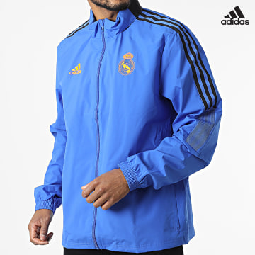 https://laboutiqueofficielle-res.cloudinary.com/image/upload/v1627638668/Desc/Watermark/adidas_performance.svg Adidas Sportswear - Veste Zippée Capuche Real Madrid HA2563 Bleu Roi