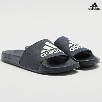https://laboutiqueofficielle-res.cloudinary.com/image/upload/v1627638668/Desc/Watermark/adidas_performance.svg Adidas Sportswear - Claquettes Adilette Shower GZ3774 Bleu Marine