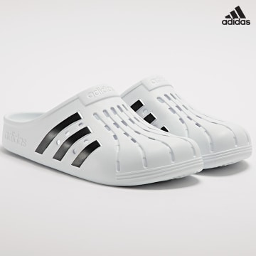 https://laboutiqueofficielle-res.cloudinary.com/image/upload/v1627638668/Desc/Watermark/adidas_performance.svg Adidas Sportswear - Mules Adilette Clog FY8970 Blanc