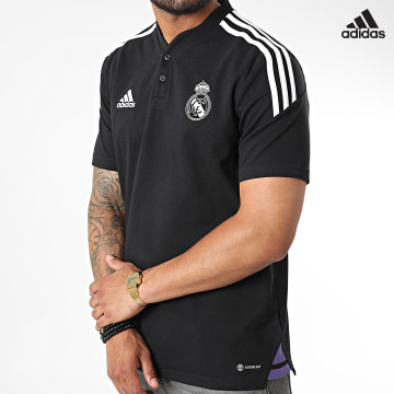https://laboutiqueofficielle-res.cloudinary.com/image/upload/v1627638668/Desc/Watermark/adidas_performance.svg Adidas Sportswear - Polo A Manches Courtes A Bandes Real Madrid HA2605 Noir