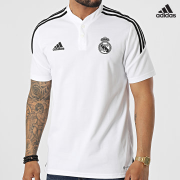 https://laboutiqueofficielle-res.cloudinary.com/image/upload/v1627638668/Desc/Watermark/adidas_performance.svg Adidas Performance - Polo A Manches Courtes A Bandes Real Madrid HA2605 Blanc