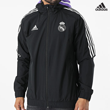 https://laboutiqueofficielle-res.cloudinary.com/image/upload/v1627638668/Desc/Watermark/adidas_performance.svg Adidas Performance - Veste Zippée A Bandes Real Madrid HA2607 Noir
