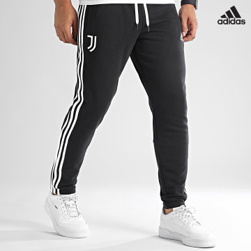 https://laboutiqueofficielle-res.cloudinary.com/image/upload/v1627638668/Desc/Watermark/adidas_performance.svg Adidas Sportswear - Pantalon Jogging A Bandes HU1185 Noir