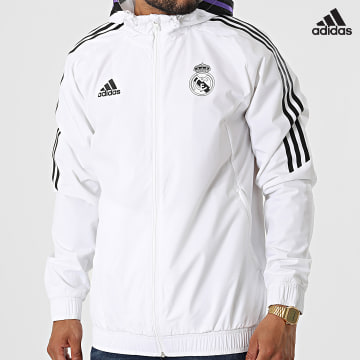 https://laboutiqueofficielle-res.cloudinary.com/image/upload/v1627638668/Desc/Watermark/adidas_performance.svg Adidas Performance - Coupe-Vent Capuche Real Madrid HA2608 Blanc