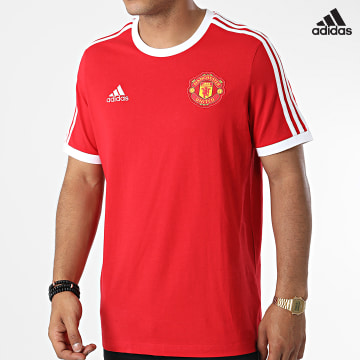 https://laboutiqueofficielle-res.cloudinary.com/image/upload/v1627638668/Desc/Watermark/adidas_performance.svg Adidas Performance - Tee Shirt A Bandes Manchester United DNA 3 Stripes HE6657 Rouge