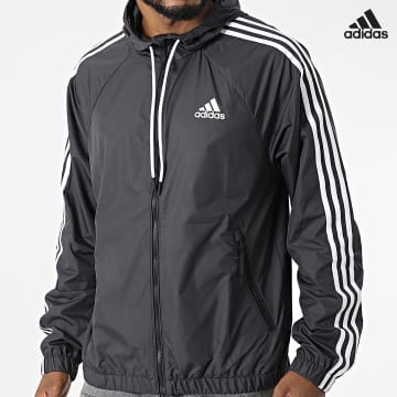https://laboutiqueofficielle-res.cloudinary.com/image/upload/v1627638668/Desc/Watermark/adidas_performance.svg Adidas Sportswear - Coupe-Vent A Capuche A Bandes BSC 3 Stripes H65776 Gris Anthracite