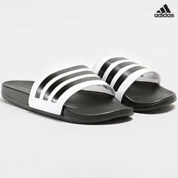 https://laboutiqueofficielle-res.cloudinary.com/image/upload/v1627638668/Desc/Watermark/adidas_performance.svg Adidas Sportswear - Claquettes Adilette Comfort GZ5893 Noir Blanc