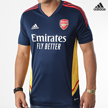 https://laboutiqueofficielle-res.cloudinary.com/image/upload/v1627638668/Desc/Watermark/adidas_performance.svg Adidas Sportswear - Tee Shirt A Bandes Arsenal FC HA5276 Bleu Marine