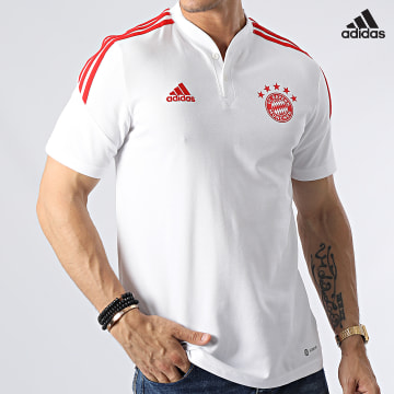 https://laboutiqueofficielle-res.cloudinary.com/image/upload/v1627638668/Desc/Watermark/adidas_performance.svg Adidas Sportswear - Polo Manches Courtes A Bandes FC Bayern HB0614 Blanc