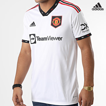 https://laboutiqueofficielle-res.cloudinary.com/image/upload/v1627638668/Desc/Watermark/adidas_performance.svg Adidas Sportswear - Tee Shirt De Sport Col V Manchester United H13880 Blanc