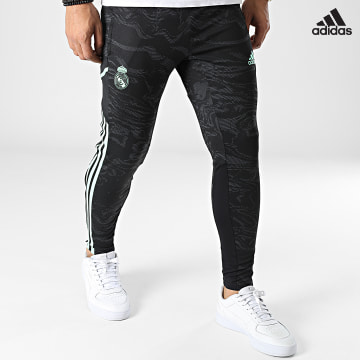 https://laboutiqueofficielle-res.cloudinary.com/image/upload/v1627638668/Desc/Watermark/adidas_performance.svg Adidas Performance - Pantalon Jogging A Bandes Real Madrid HD1202 Noir