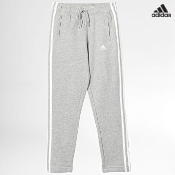 https://laboutiqueofficielle-res.cloudinary.com/image/upload/v1627638668/Desc/Watermark/adidas_performance.svg Adidas Sportswear - Pantalon Jogging A Bandes Enfant 3 Stripes IC6127 Gris Chiné