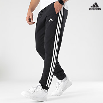 https://laboutiqueofficielle-res.cloudinary.com/image/upload/v1627638668/Desc/Watermark/adidas_performance.svg Adidas Sportswear - Pantalon Jogging A Bandes HA4337 Noir