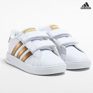 https://laboutiqueofficielle-res.cloudinary.com/image/upload/v1627638668/Desc/Watermark/adidas_performance.svg Adidas Sportswear - Baskets Enfant Grand Court 2.0 CF Footwear White Magic Gold