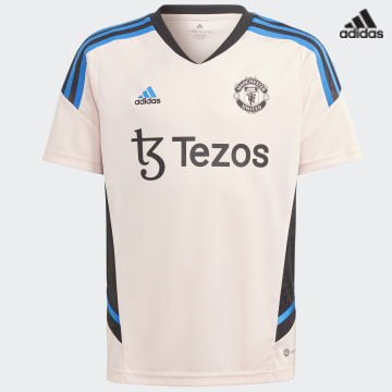 https://laboutiqueofficielle-res.cloudinary.com/image/upload/v1627638668/Desc/Watermark/adidas_performance.svg Adidas Sportswear - Tee Shirt A Bandes Enfant Manchester United HT4298 Rose