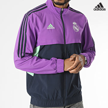 https://laboutiqueofficielle-res.cloudinary.com/image/upload/v1627638668/Desc/Watermark/adidas_performance.svg Adidas Sportswear - Veste De Sport Zippée A Bandes Real Madrid HT8805 Violet Bleu Marine