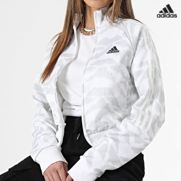 https://laboutiqueofficielle-res.cloudinary.com/image/upload/v1627638668/Desc/Watermark/adidas_performance.svg Adidas Sportswear - Veste Zippée Femme Tiro IC6653 Blanc