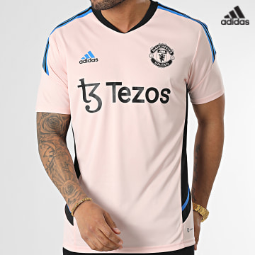 https://laboutiqueofficielle-res.cloudinary.com/image/upload/v1627638668/Desc/Watermark/adidas_performance.svg Adidas Sportswear - Tee Shirt A Bandes Manchester United HT4293 Rose
