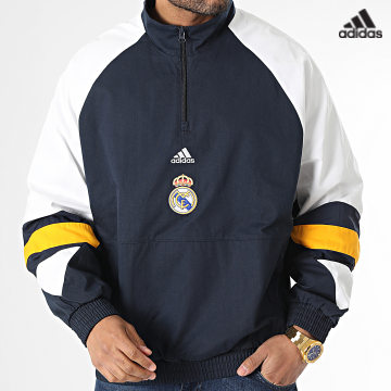 https://laboutiqueofficielle-res.cloudinary.com/image/upload/v1627638668/Desc/Watermark/adidas_performance.svg Adidas Sportswear - Sweat Col Zippé Real Madrid Icon HT6455 Bleu Marine Blanc