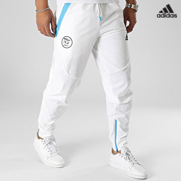 https://laboutiqueofficielle-res.cloudinary.com/image/upload/v1627638668/Desc/Watermark/adidas_performance.svg Adidas Sportswear - Pantalon Jogging FAF IC1557 Blanc