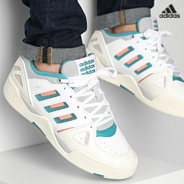 https://laboutiqueofficielle-res.cloudinary.com/image/upload/v1627638668/Desc/Watermark/adidas_performance.svg Adidas Sportswear - Baskets Midcity Low ID5403 Cloud White Arc Fushia Turquoise