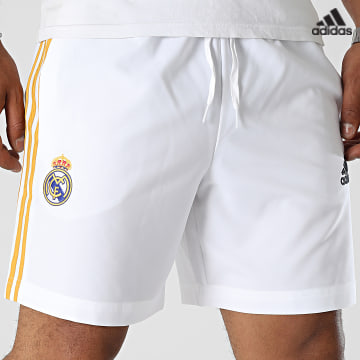 https://laboutiqueofficielle-res.cloudinary.com/image/upload/v1627638668/Desc/Watermark/adidas_performance.svg Adidas Sportswear - Short Jogging A Bandes Real Madrid HY0614 Blanc