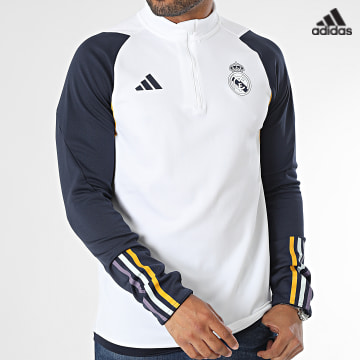 https://laboutiqueofficielle-res.cloudinary.com/image/upload/v1627638668/Desc/Watermark/adidas_performance.svg Adidas Sportswear - Sweat Col Zippé Slim Real Madrid IB0874 Blanc Bleu Marine