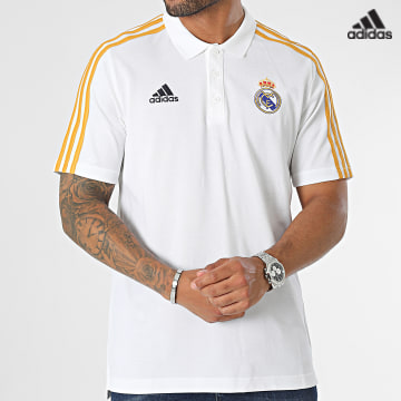 https://laboutiqueofficielle-res.cloudinary.com/image/upload/v1627638668/Desc/Watermark/adidas_performance.svg Adidas Sportswear - Polo Manches Courtes A Bandes Real Madrid HY0607 Beige Clair