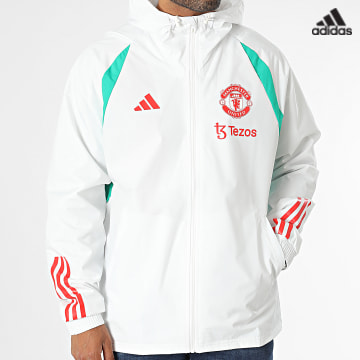 https://laboutiqueofficielle-res.cloudinary.com/image/upload/v1627638668/Desc/Watermark/adidas_performance.svg Adidas Sportswear - Coupe-Vent Capuche Manchester United IA7297 Blanc