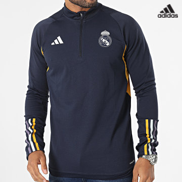 https://laboutiqueofficielle-res.cloudinary.com/image/upload/v1627638668/Desc/Watermark/adidas_performance.svg Adidas Sportswear - Sweat Col Zippé Tiro IB0873 Real Madrid Bleu Marine