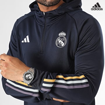https://laboutiqueofficielle-res.cloudinary.com/image/upload/v1627638668/Desc/Watermark/adidas_performance.svg Adidas Sportswear - Sweat Capuche A Bandes Real Madrid IB0043 Bleu Marine
